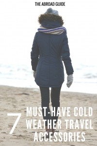 Best Cold-Weather Items to Bring When Traveling - a list of what travel accessories to pack and bring with you on a cold weather trip abroad. Keep warm while traveling this winter with these 7 accessories that will help you stay warm while on cold walking tours and doing activities like skiing.