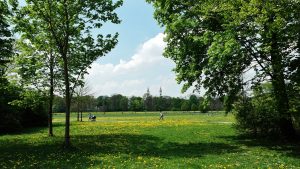 Places to Visit Spring in Europe - Munich has a garden that's 4 times larger than Central Park, and there's even a river where you can go surfing.