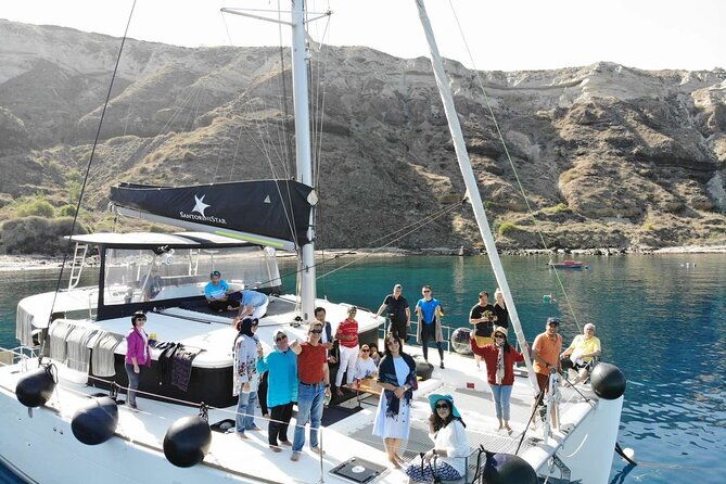 half-day-exclusive-catamaran-cruise-in-santorini-with-meal-and-open-bar