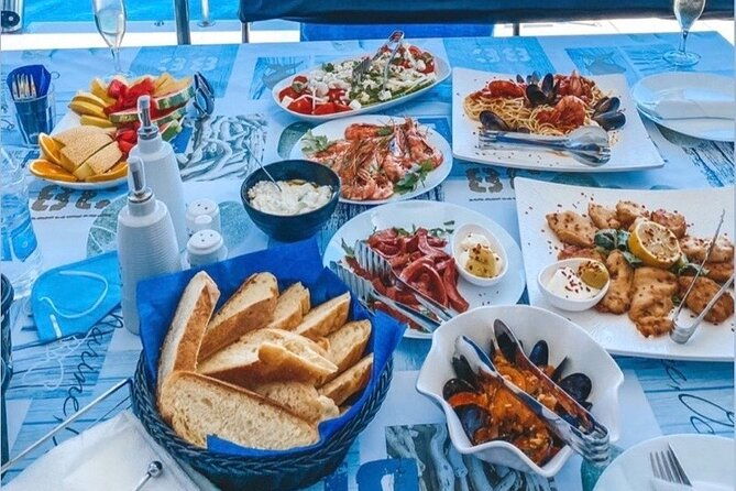 half-day-exclusive-catamaran-cruise-in-santorini-with-meal-and-open-bar
