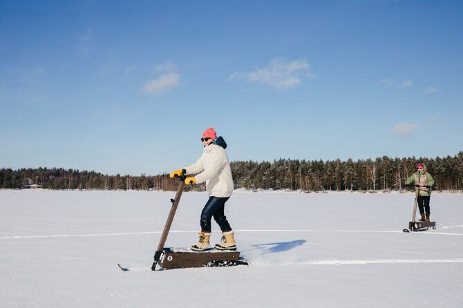 private-driving-snow-scooters-experience-in-finland