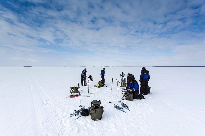 arctic-day-with-ice-fishing-and-floating
