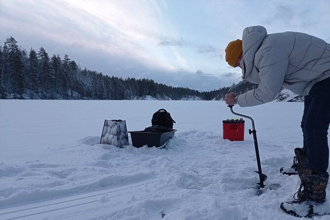 ice-fishing-experience-with-backpacker-helsinki-tour