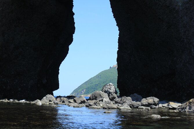 sea-kayaking-on-the-pristine-hokkaido-coastline-to-blue-cave