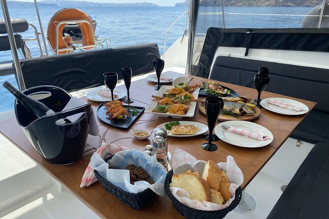 half-day-premium-catamaran-cruise-in-santorini-including-oia