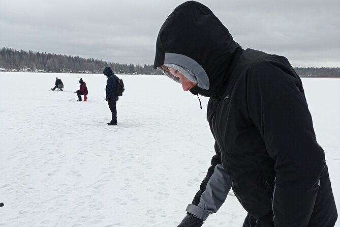 ice-fishing-experience-with-backpacker-helsinki-tour