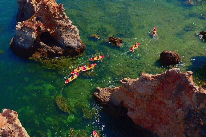 explore-secret-caves-and-beaches-of-alvor-boat-kayak-tour