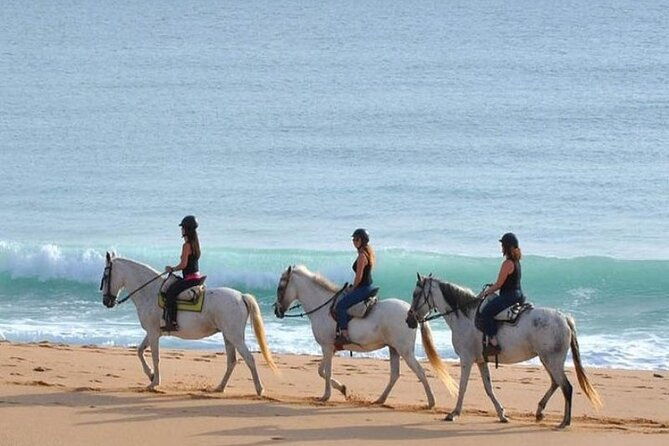 horseback-riding-in-the-sunset-of-famara-beach-lanzarote-spain