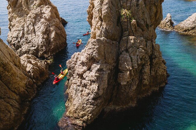 tossa-de-mar-kayak-snorkel-tour-with-paella-from-barcelona