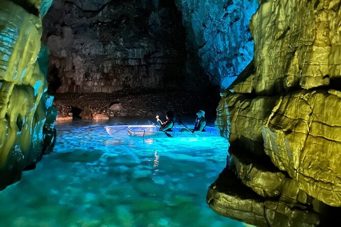 blue-cave-transparent-kayak-night-glow-adventure