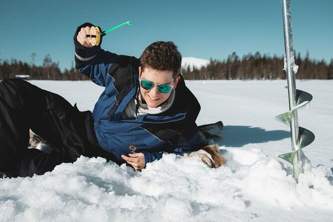 lappish-lunch-break-snowmobiling-ice-fishing-and-tasty-food
