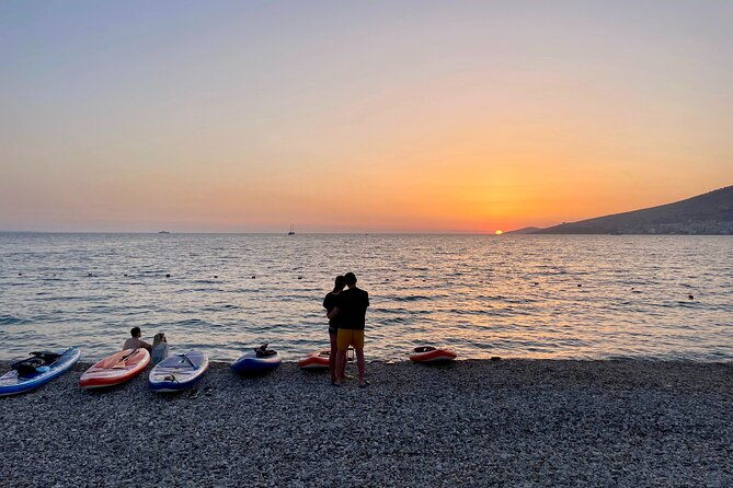 sunset-saranda-and-night-city-glow-kayak-or-sup-tour