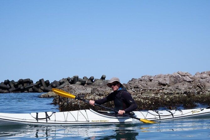 sea-kayaking-on-the-pristine-hokkaido-coastline-to-blue-cave