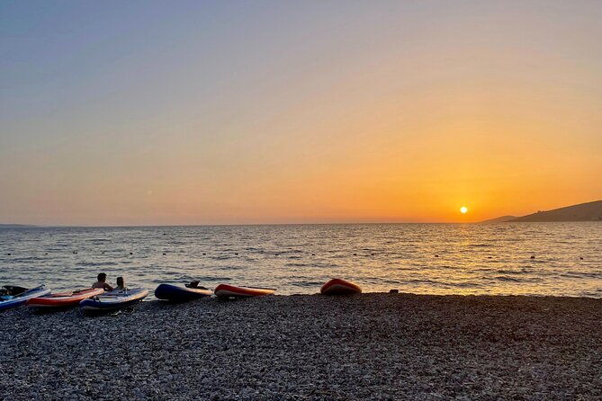 sunset-saranda-and-night-city-glow-kayak-or-sup-tour