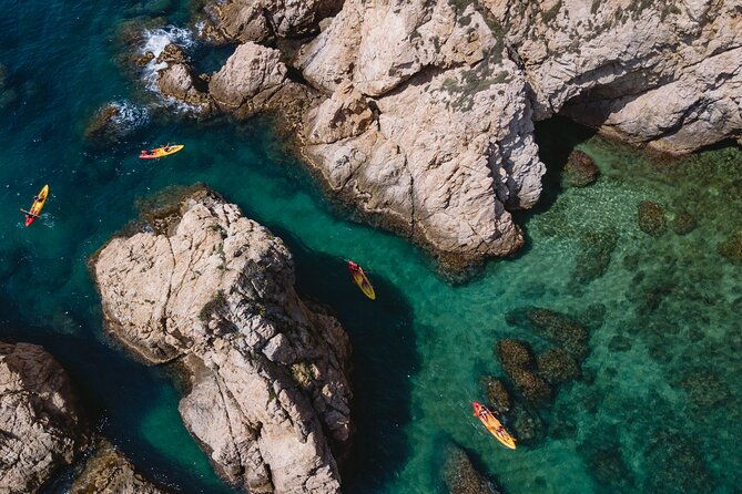 tossa-de-mar-kayak-snorkel-tour-with-paella-from-barcelona