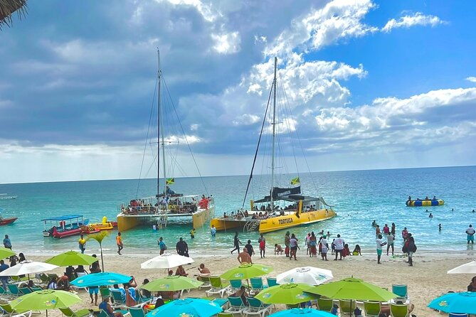 7-mile-beach-party-catamaran-cruise-with-snorkeling-ricks-cafe