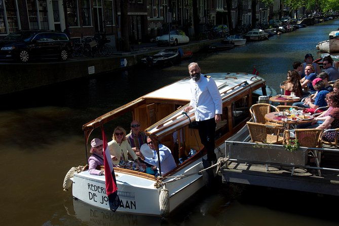 private-guided-historic-amsterdam-canal-cruise-in-a-salon-boat