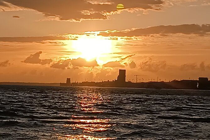 sunset-sailing-boat-trip-in-lisbon-with-snacks