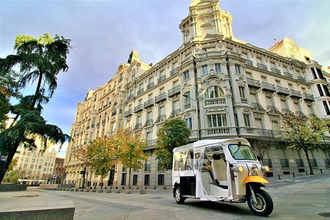 tour-of-historic-and-modern-madrid-with-a-guide-in-a-yellow-tuk-tuk