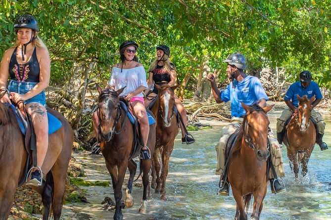 dunns-river-falls-climb-plus-ziplines-atv-horse-ride-swim-from-montego-bay