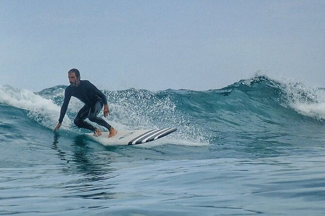 group-longboard-surf-lesson-in-lanzarote