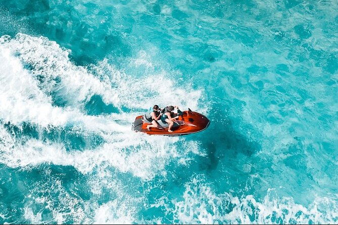 jet-skiing-around-la-famille-ship-and-smaller-pristine-cays