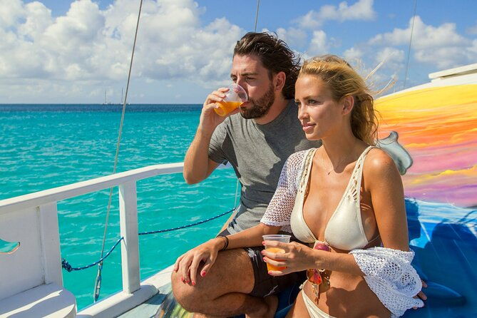 private-catamaran-adventure-cruise-with-rope-swing-and-water-slide
