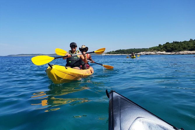 transparent-kayaking-or-sup-ing-around-islands