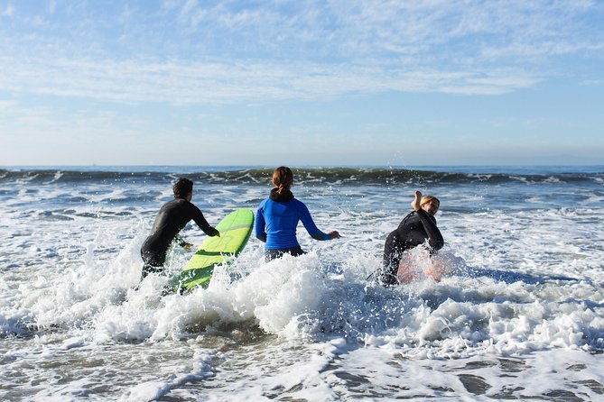 private-surf-lesson-with-instructor-board-wetsuit