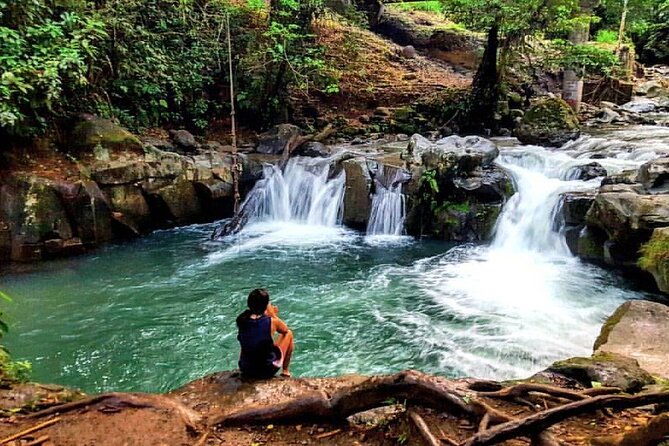 private-yoga-class-on-rainforest-river-platform