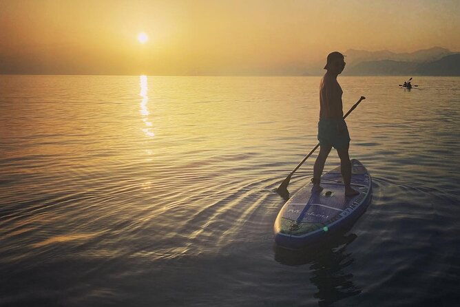 sunset-saranda-and-night-city-glow-kayak-or-sup-tour-2