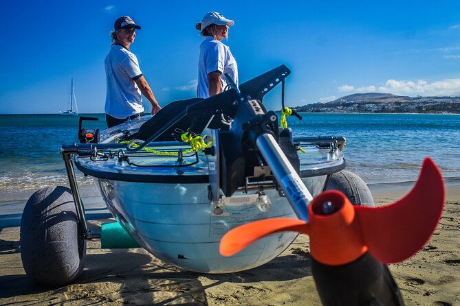 transparent-electric-kayaks-with-guide