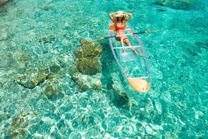 transparent-kayaking-or-sup-ing-around-islands