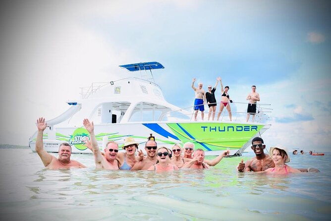 catamaran-party-boat-half-day-trip-with-snorkeling-and-natural-pool