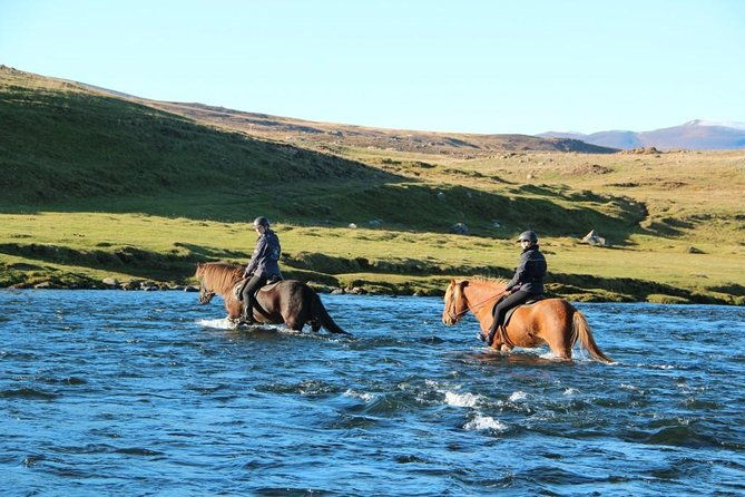 horse-riding-tour-to-the-glacier-river-delta-with-waterfall