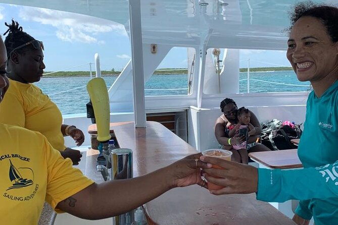 luxury-catamaran-cruise-sip-sail-snorkel-and-swim-with-pigs