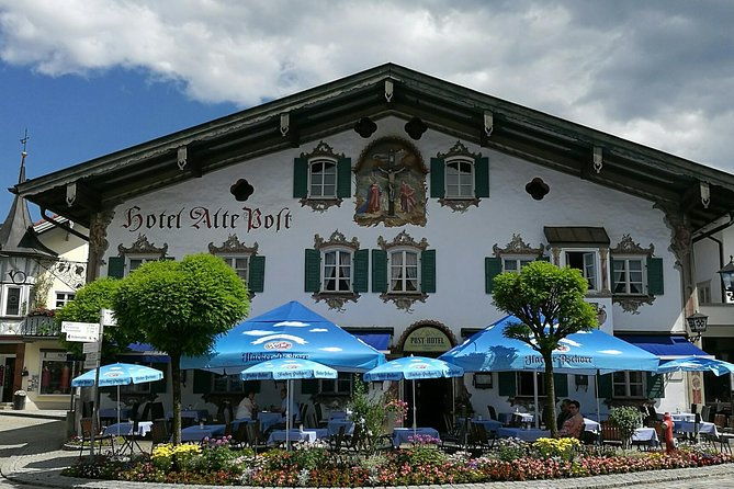 munich-private-car-walking-tour-incl-bmw-world-river-surfers-2