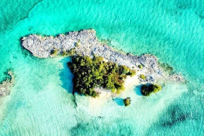 private-island-getaway-kayak-snorkeling-tropical-drinks-beach