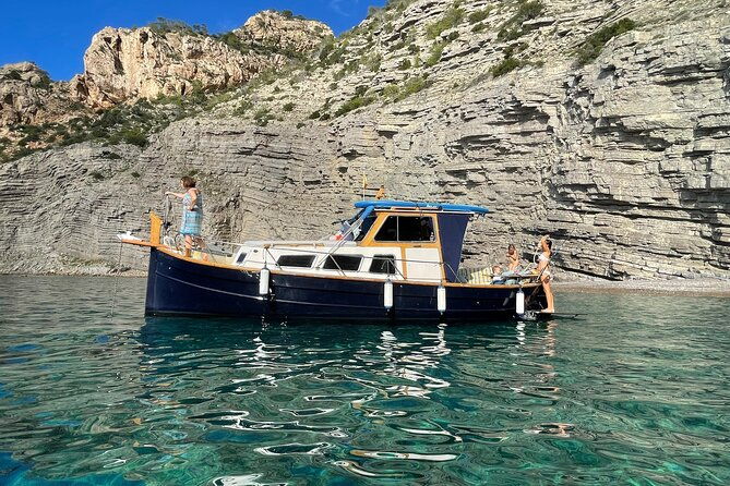 private-mediterranean-classic-boat-with-paddle-boardssnorkelling