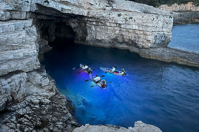 pula-sunset-night-time-illuminated-transparent-kayak-cave-tour