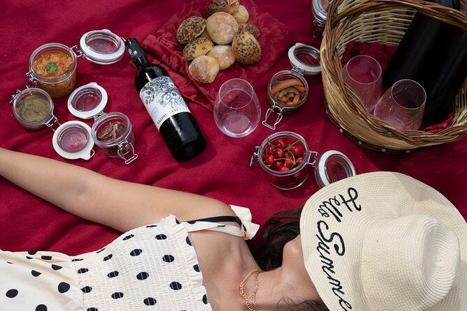 winery-tour-picnic-in-the-vineyard-with-a-bottle-of-wine