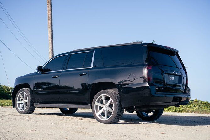 black-cadillac-escalade-suburban-round-trip-airport-transfer-uvf