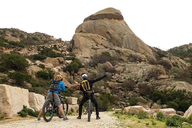 from-the-hills-to-oasi-biderosa-capo-comino-with-electric-mountain-bikes