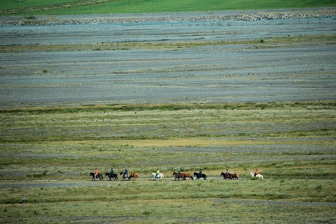 horse-riding-tour-to-the-glacier-river-delta-with-waterfall