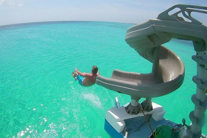 private-catamaran-adventure-cruise-with-rope-swing-and-water-slide