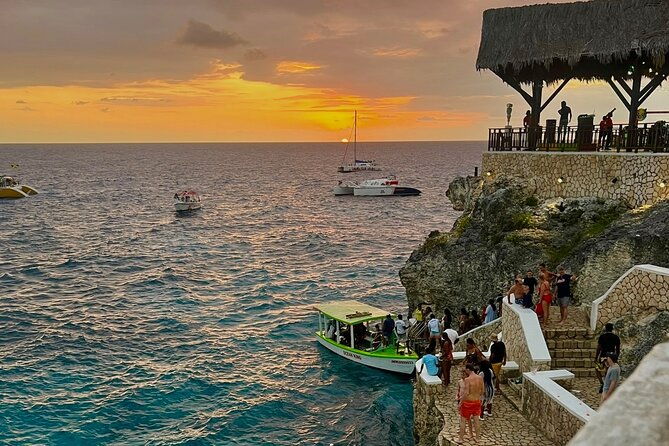 ricks-cafe-sunset-experience-with-bamboo-rafting-and-foot-massage