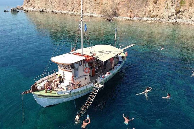 cruise-to-white-rocks-xi-beach-with-lunch-and-wine