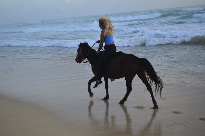horseback-riding-at-sunrise-on-the-beach-of-punta-cana