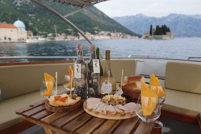 private-luxury-boat-tour-lady-of-the-rocks-and-blue-cave-up-to-15-people3hr