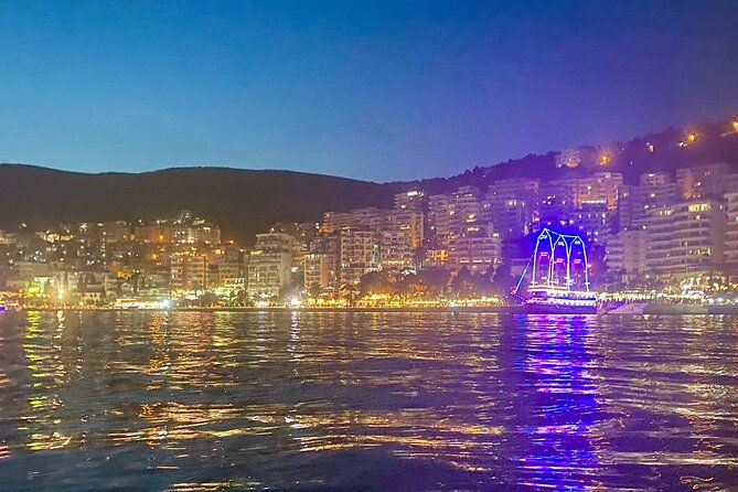 sunset-saranda-and-night-city-glow-kayak-or-sup-tour-2